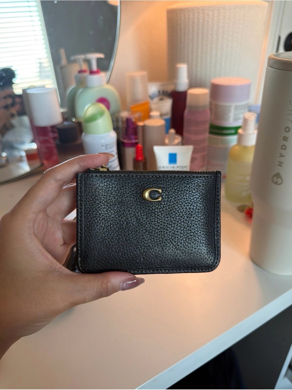Coach Black Pebbled Leather Zip Card Holder with Gold 'C'